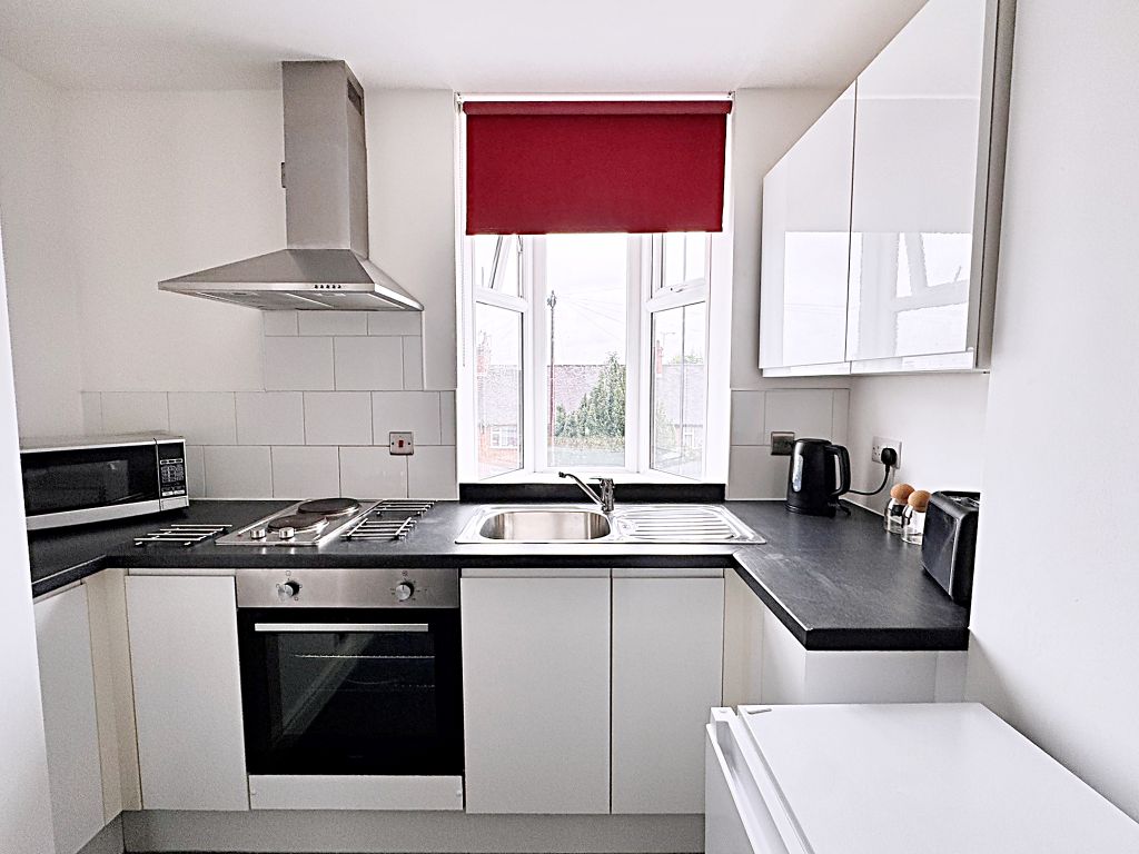 Property photo 3 of 9 Kitchen Area