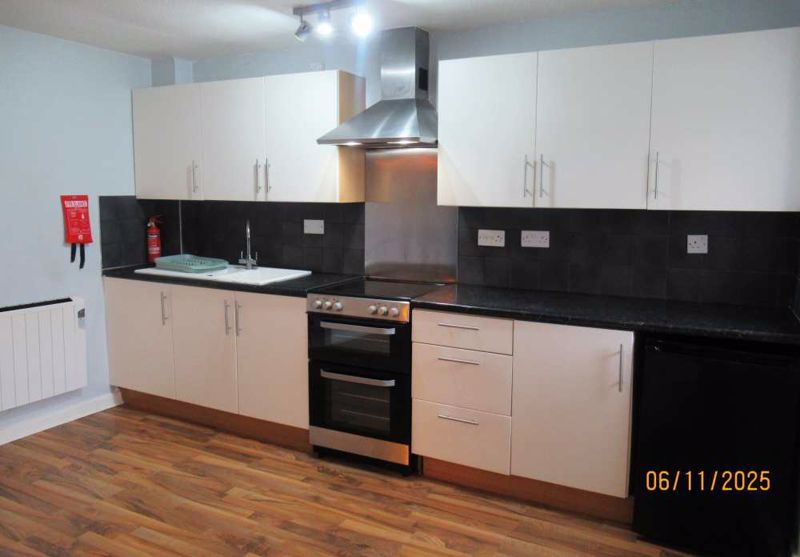 Property photo 2 of 12 Kitchen