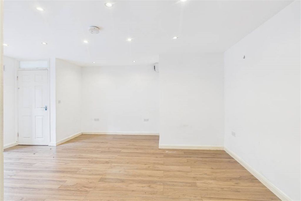 Property photo 2 of 11 Living Area