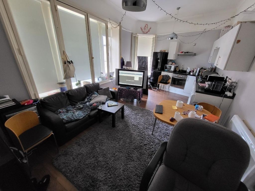 Property photo 1 of 3 A Cozy Living Room That Features Comfortable Seati...