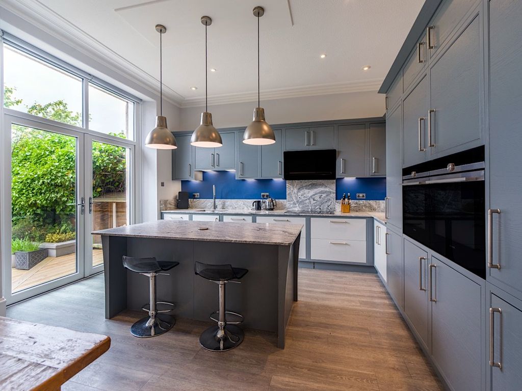 Property photo 3 of 13 Dining Kitchen