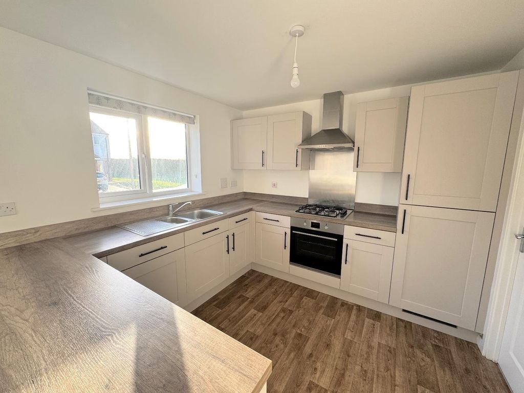 Property photo 3 of 13 Kitchen