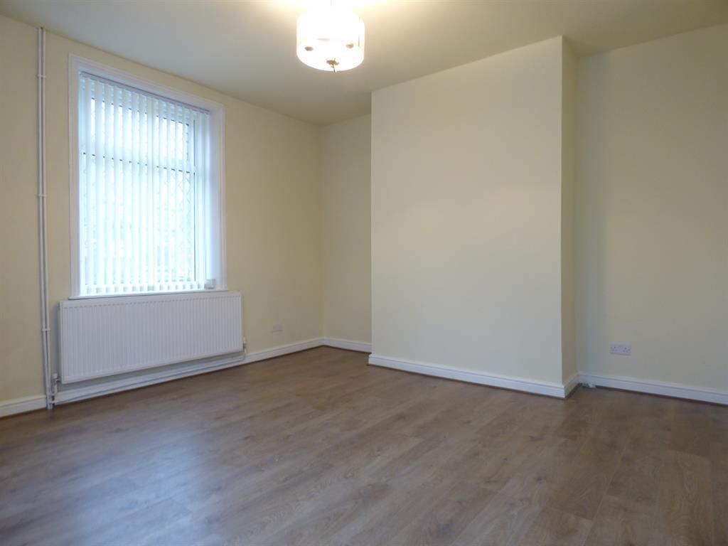 Property photo 2 of 10 Living Area