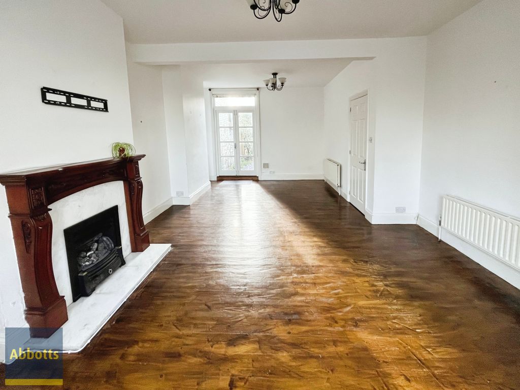 Property photo 3 of 13 Living Room 2