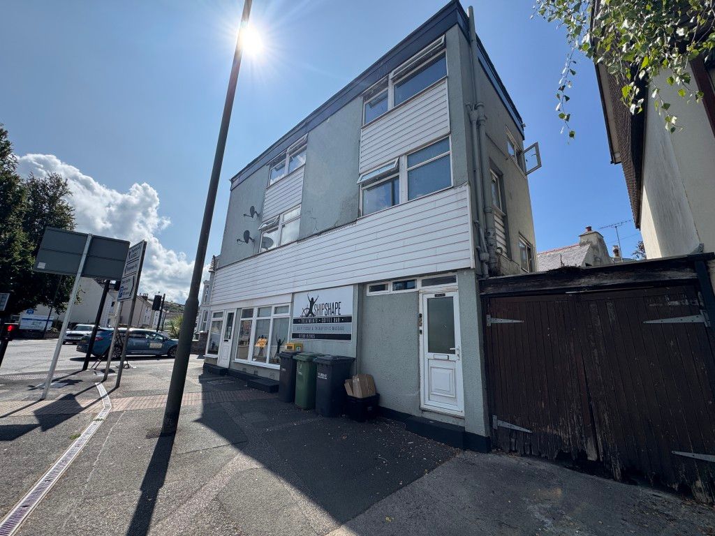 Property photo 1 of 12 Front Of The Whole Building Including Adjoining Garage