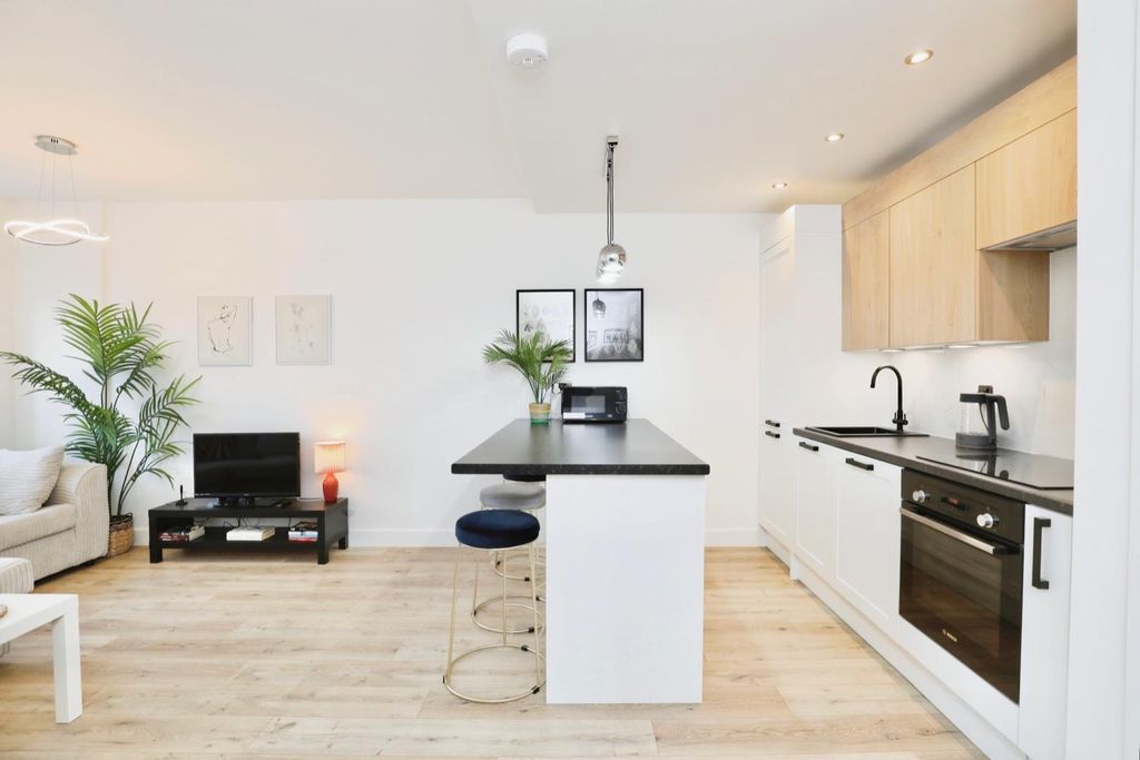 Property photo 1 of 17 Kitchen Area