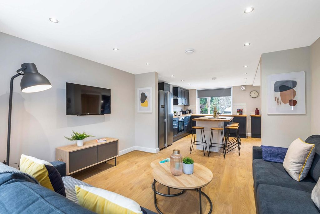 Property photo 3 of 8 Bright, Modern Open-Plan Living Area With Stylish ...