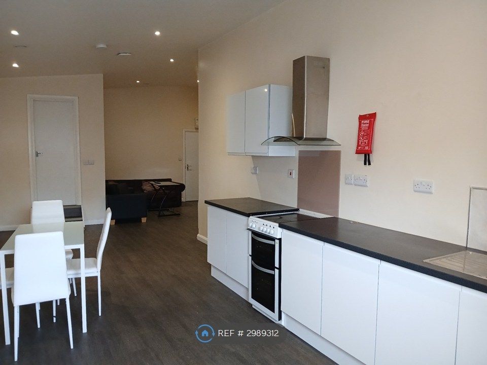 Property photo 1 of 8 Kitchen Area
