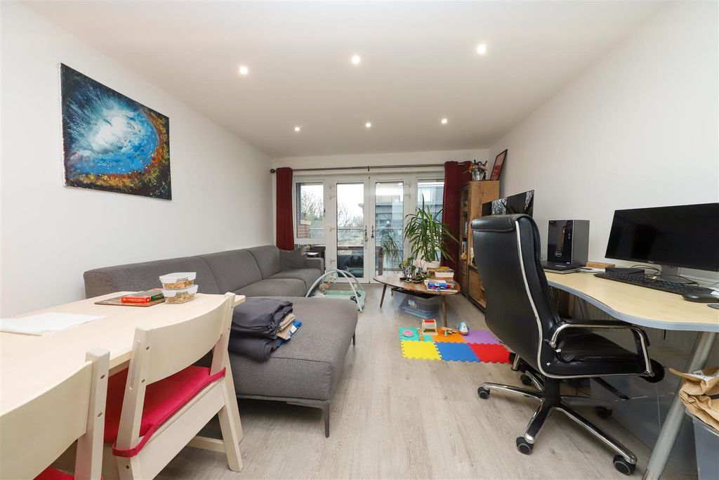 Property photo 2 of 11 Living Area