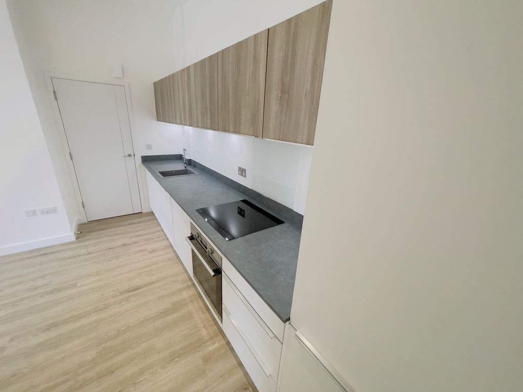 Property photo 2 of 6 Kitchen Area