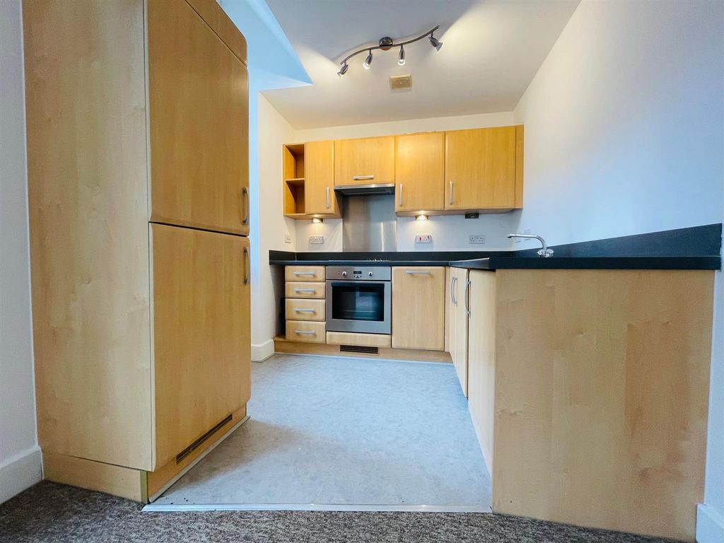 Property photo 2 of 8 Kitchen Area
