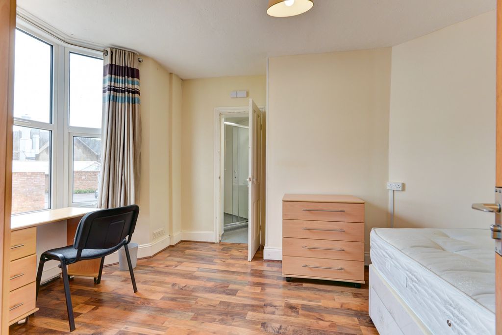 Property photo 2 of 14 Bright And Airy Bedroom With A Large Window, Minim...