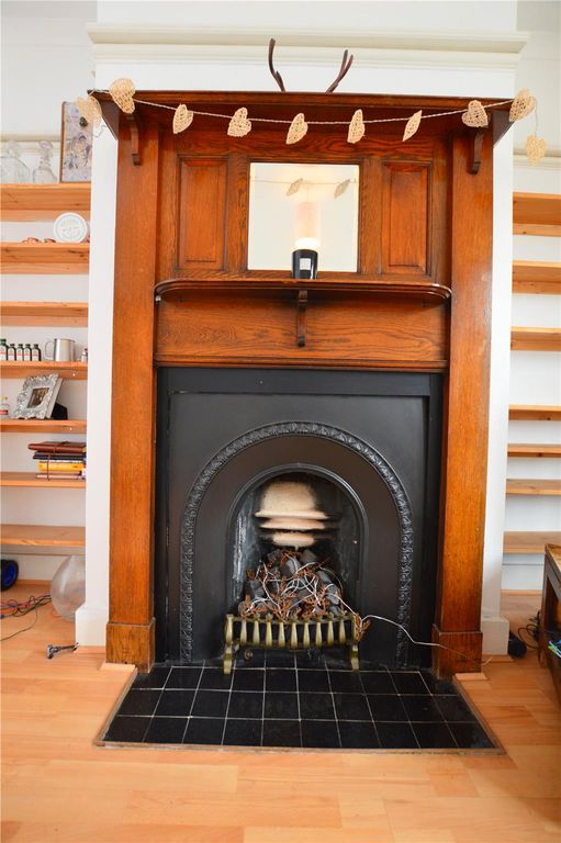 Property photo 3 of 8 Fireplace
