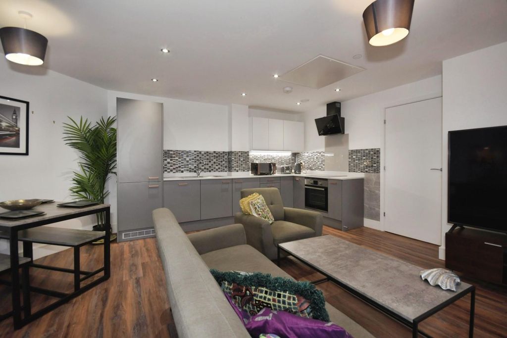 Property photo 3 of 26 Living Area