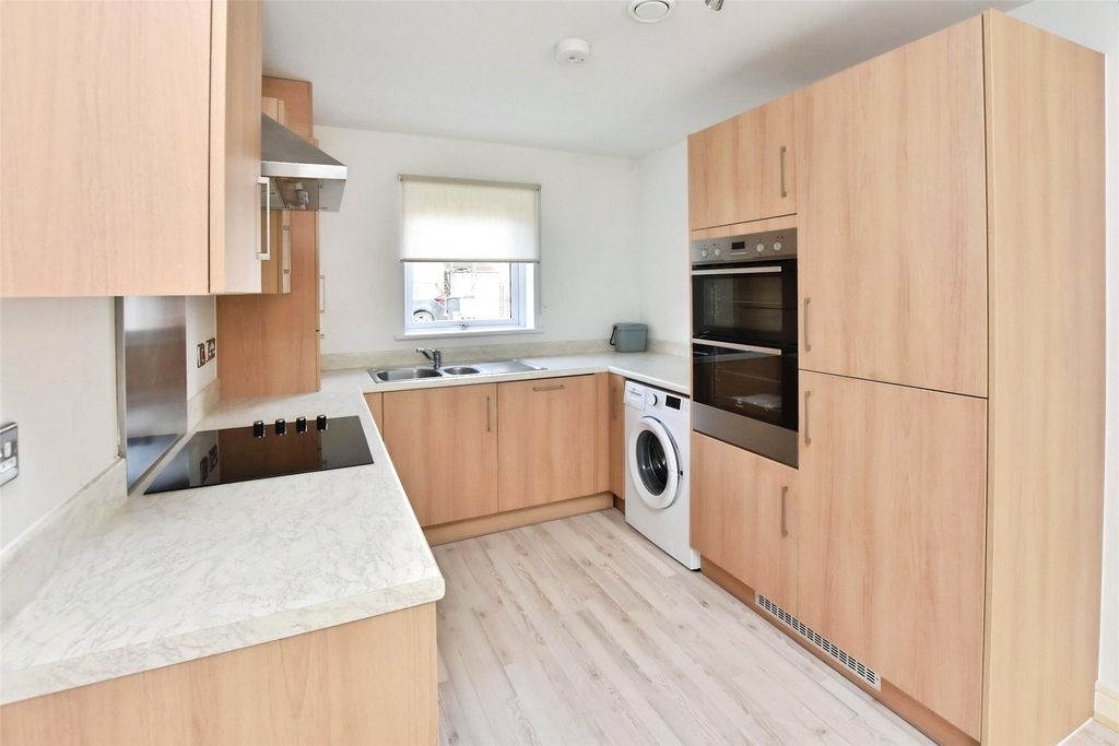 Property photo 2 of 12 Kitchen