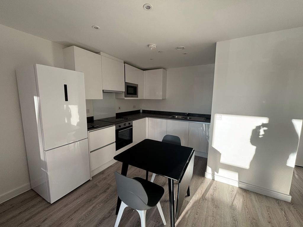 Property photo 3 of 7 Kitchen