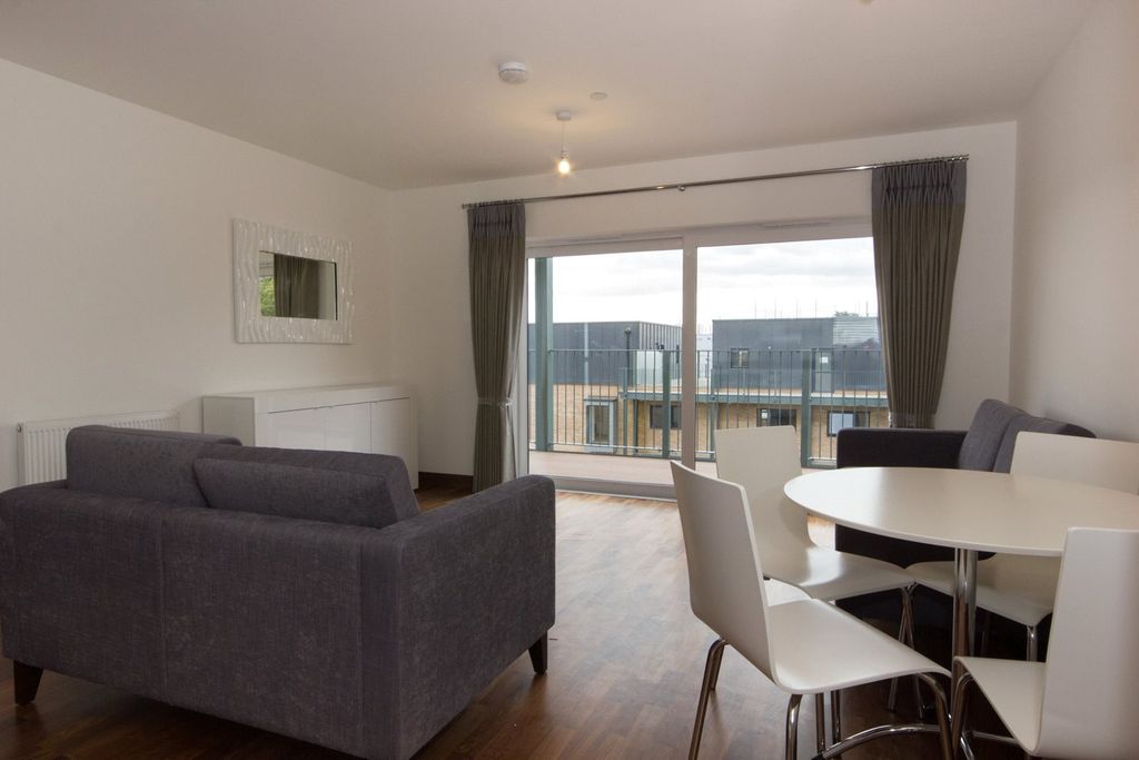 Property photo 3 of 8 Living/Dining Area