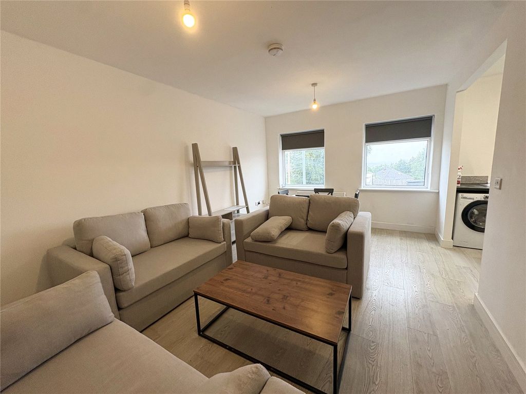 Property photo 1 of 12 Living Area