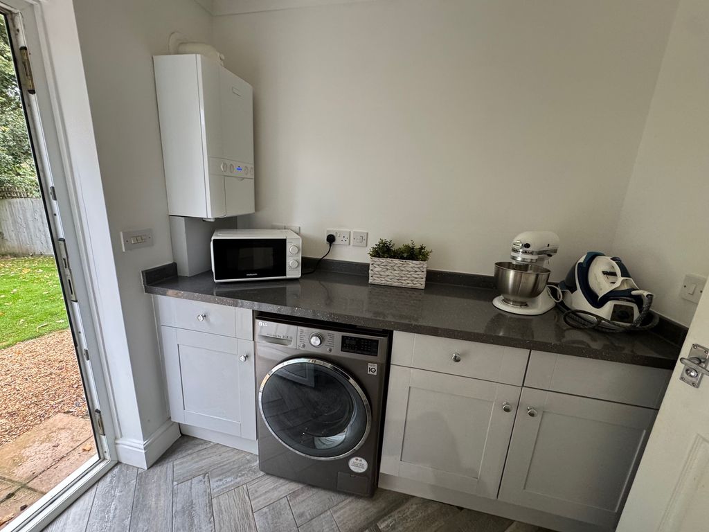 Property photo 2 of 13 Utility Room