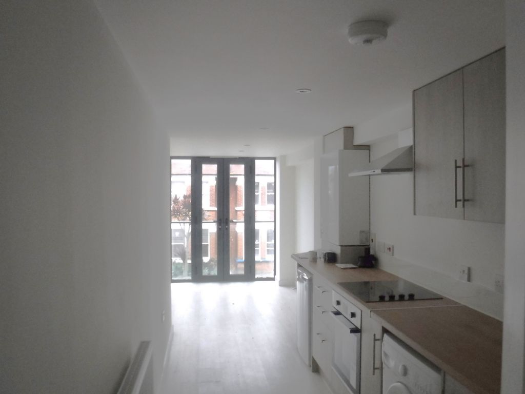 Property photo 2 of 3 Kitchen To Dining