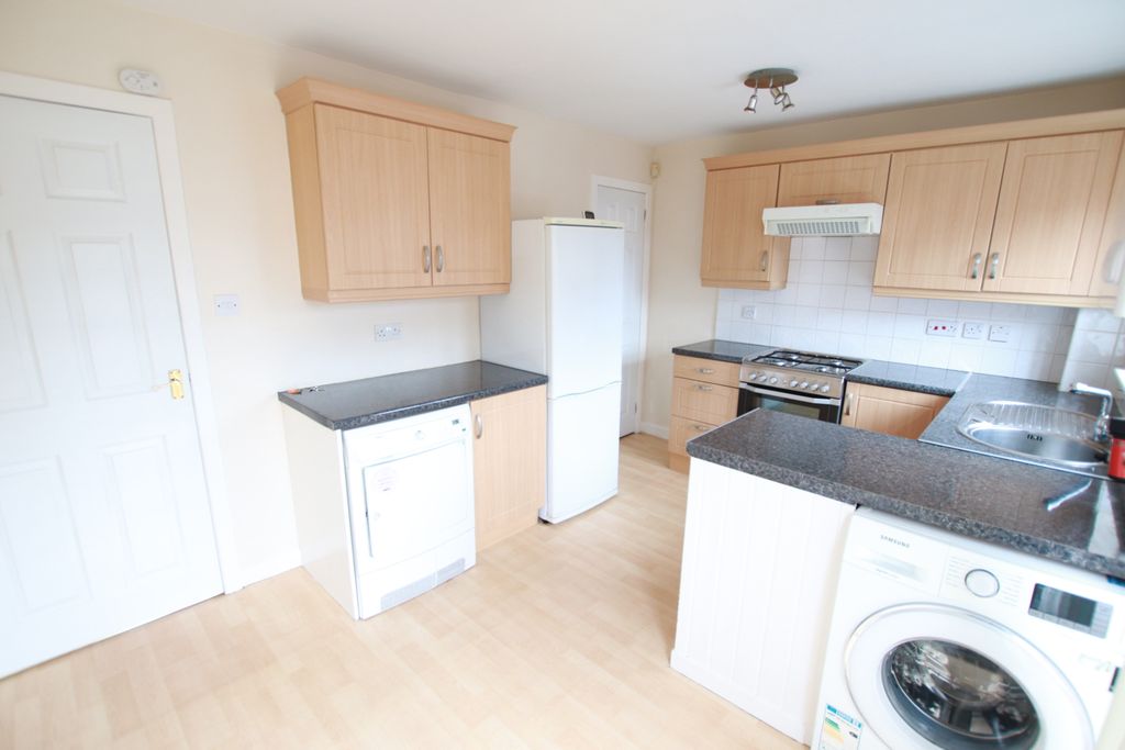 Property photo 3 of 8 Kitchen