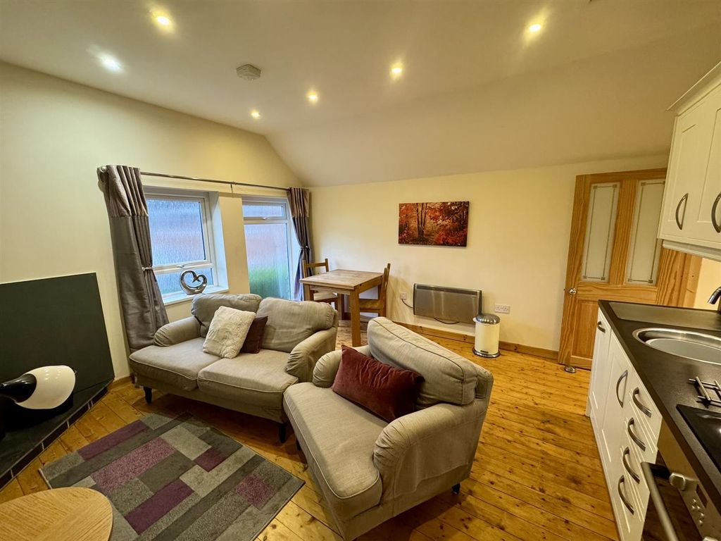 Property photo 2 of 9 Kitchen/Living/Dining