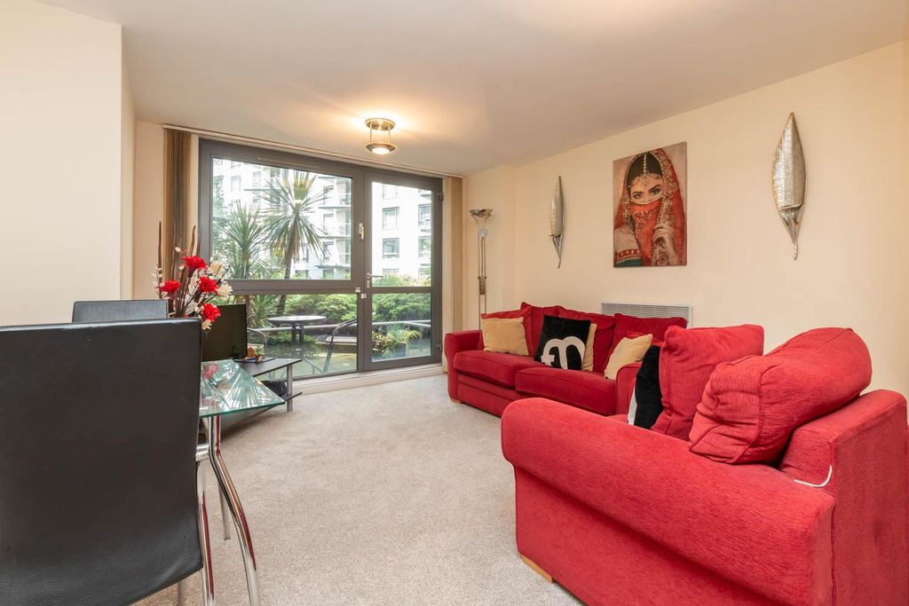 Property photo 1 of 10 Living Area