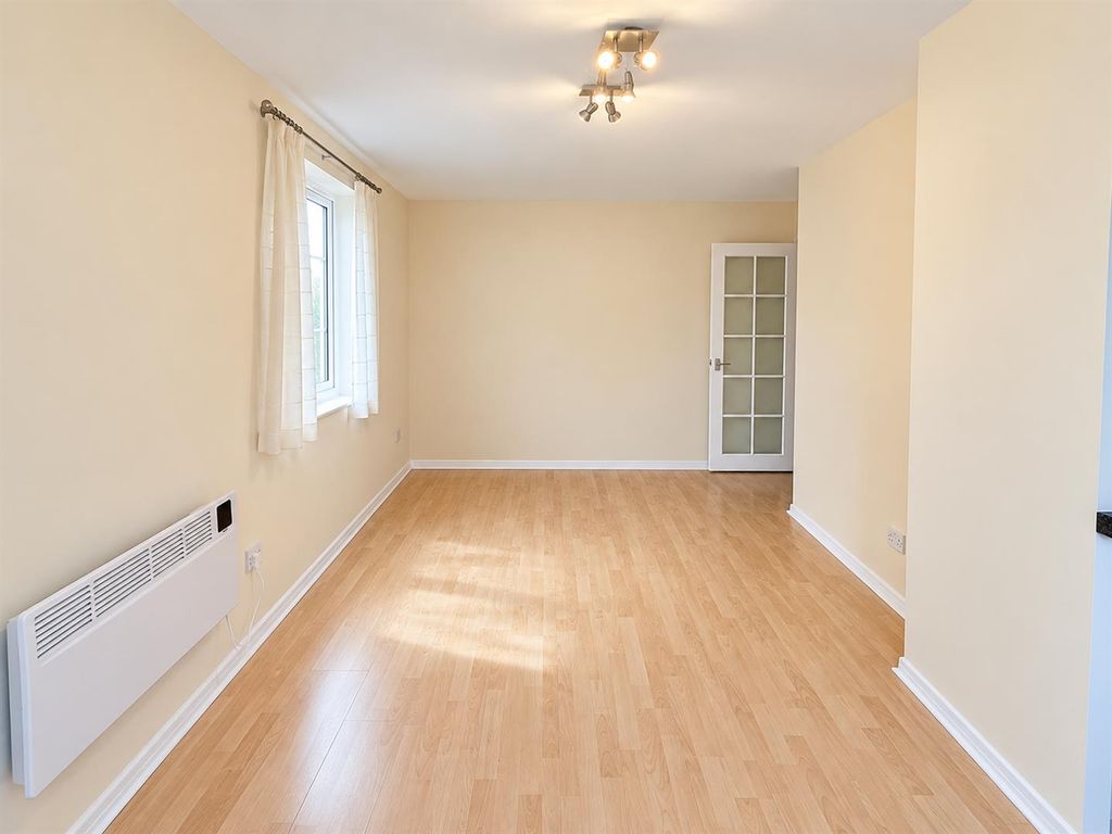 Property photo 3 of 7 Bright Minimalist Living Space.Png