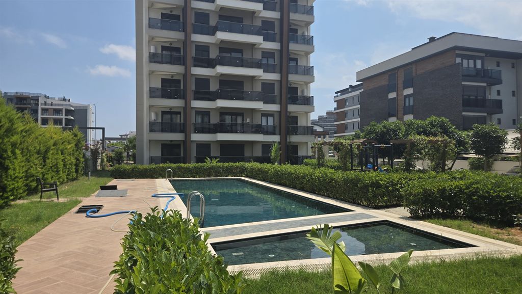 Property photo 1 of 14 Contemporary Antalya Homes In Altintas For Sale - Modern Complex With Social Outdoor Spaces