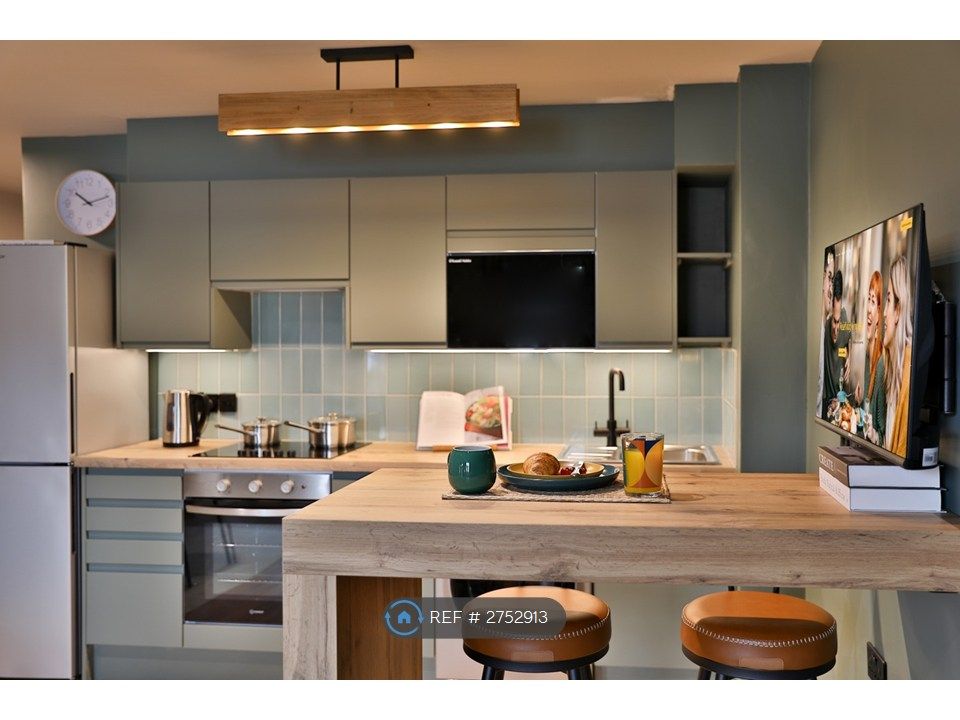 Property photo 2 of 8 Fully Equipped Kitchen