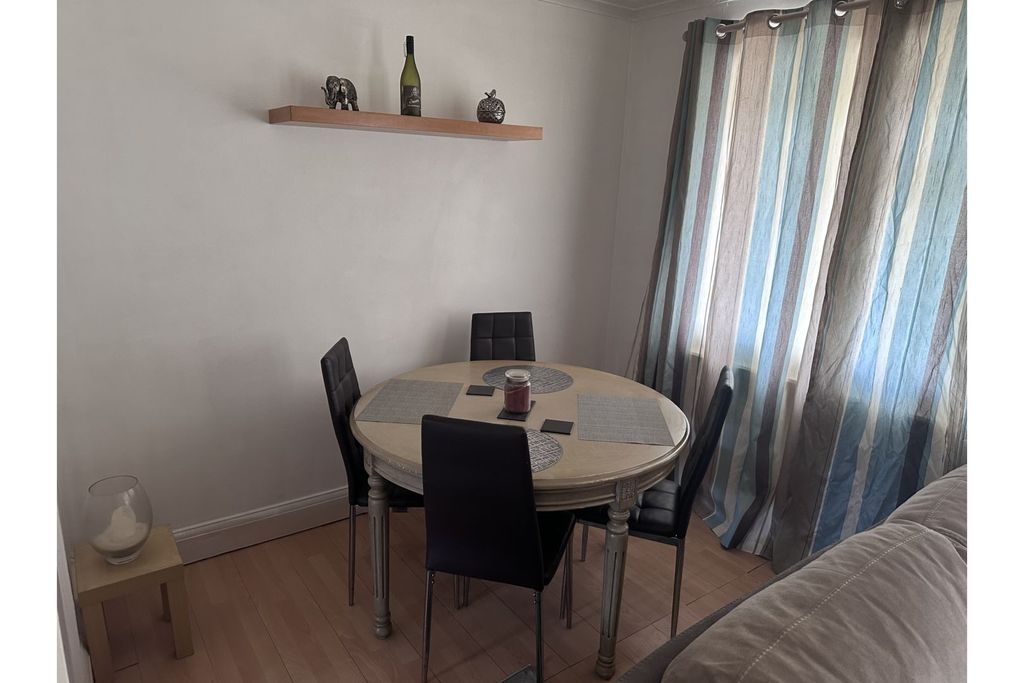Property photo 3 of 8 Living / Dining Room