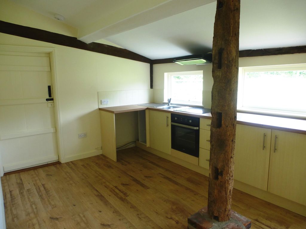 Property photo 3 of 8 Kitchen