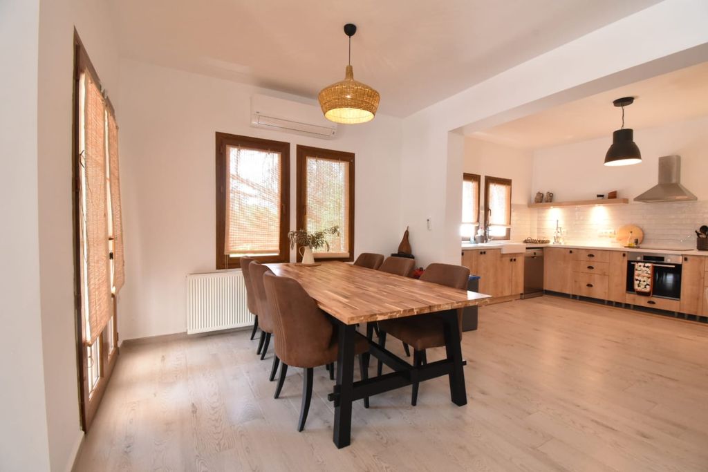 Property photo 2 of 20 Uniquely Designed Fethiye Property For Sale – A Gorgeous Open-Plan Dining Area Through To Kitchen