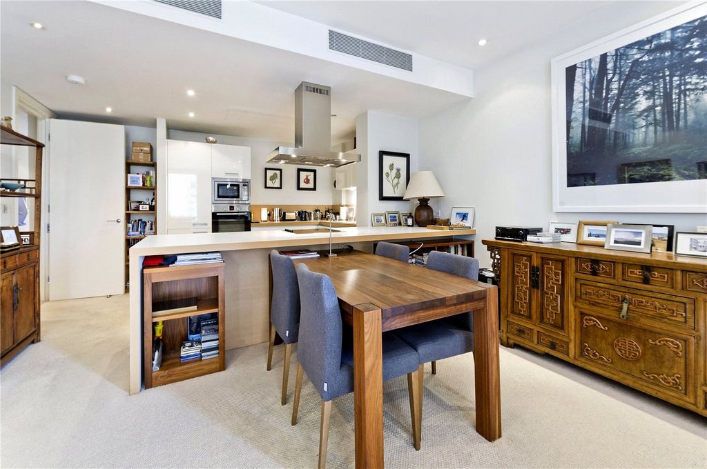 Property photo 3 of 11 Dining/Kitchen Area