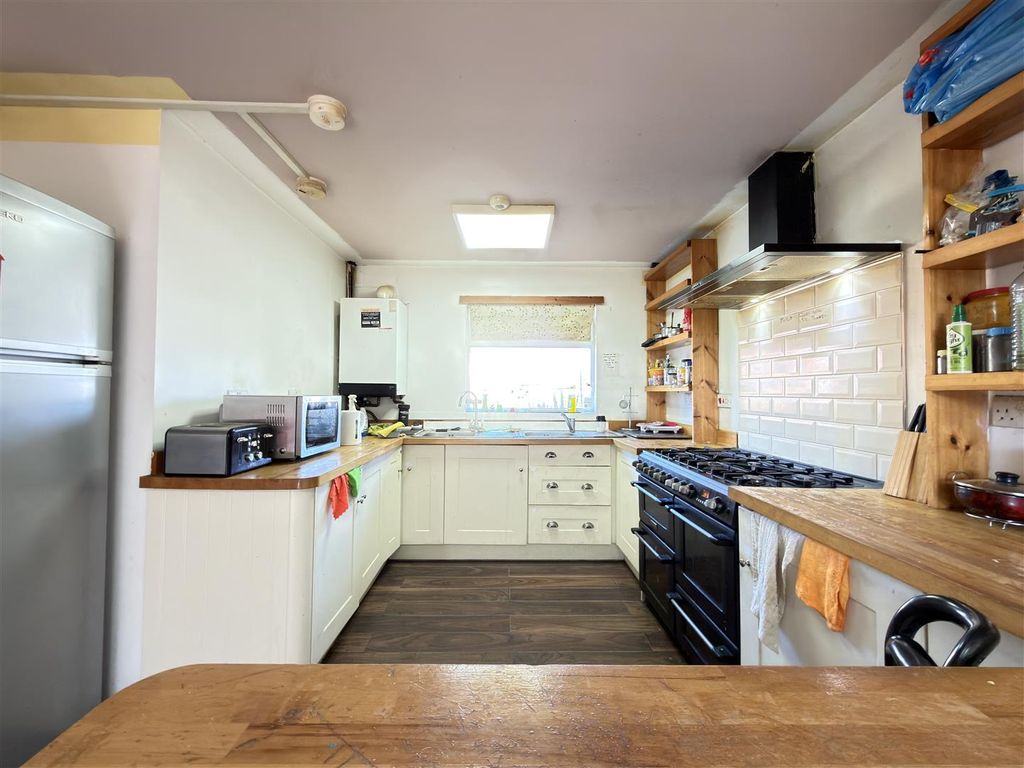 Property photo 3 of 11 Kitchen & Dining Room