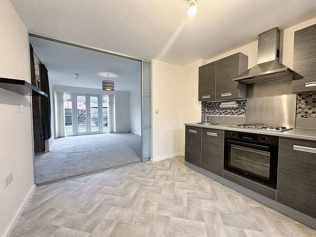 Property photo 2 of 11 Kitchen And Living Room