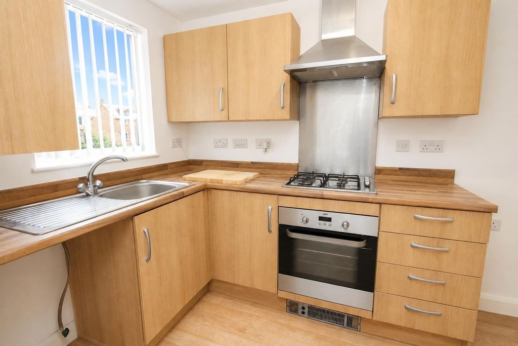 Property photo 3 of 8 Bright Kitchen With Modern Oven And Wood Finish...