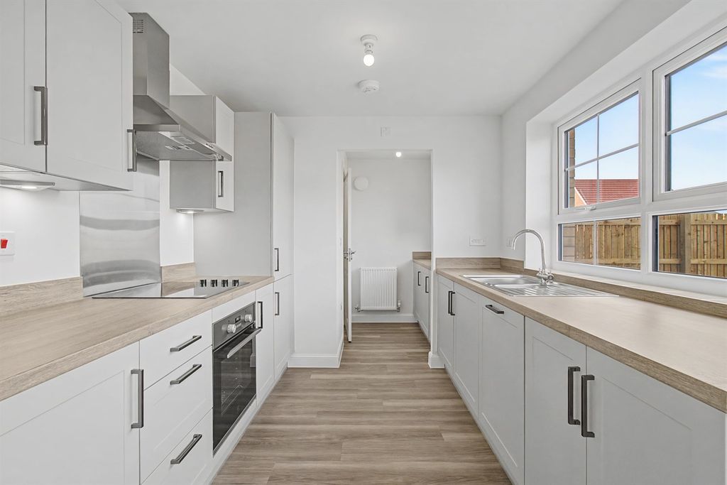 Property photo 2 of 13 Kitchen