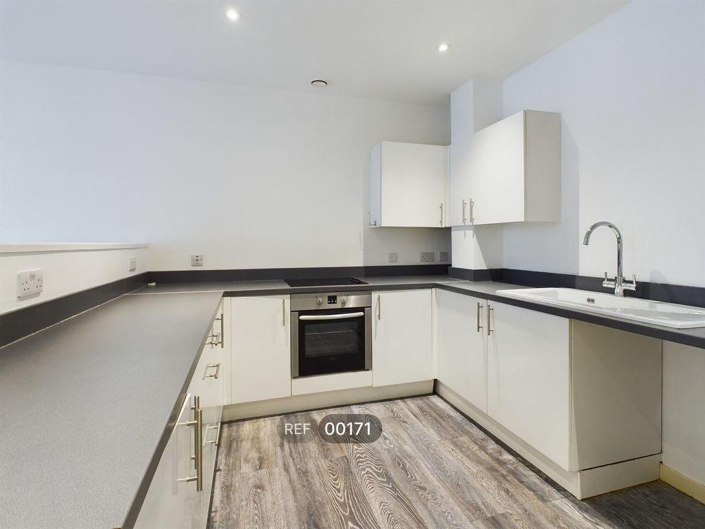 Property photo 1 of 8 Kitchen & Living Area