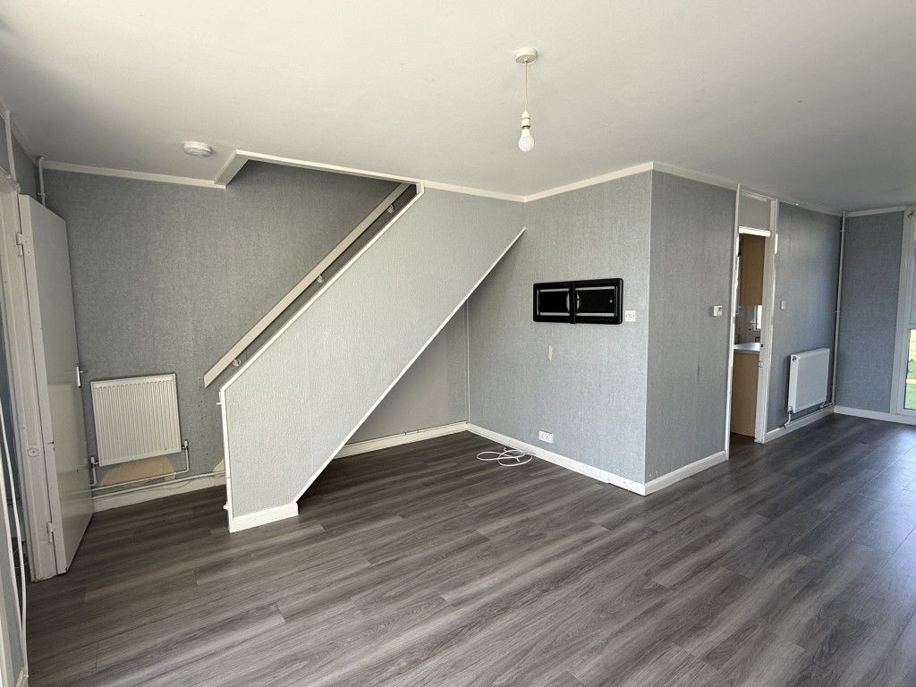 Property photo 2 of 9 Living Room Of House In Need Of Improvement