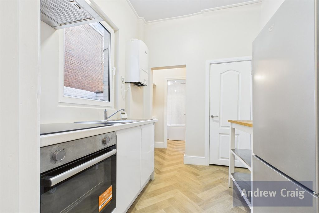 Property photo 3 of 13 Kitchen