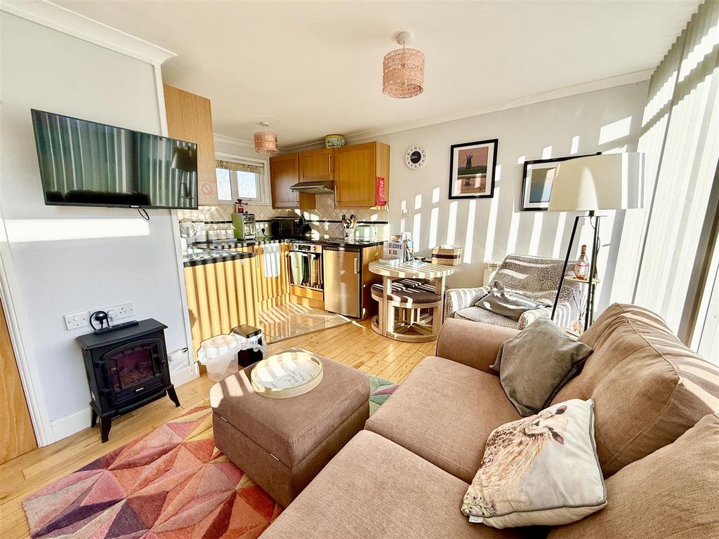 Property photo 3 of 11 Living Area