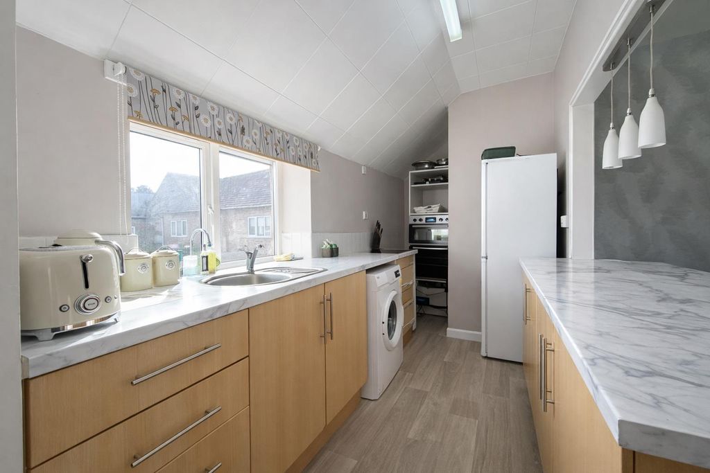 Property photo 3 of 12 Kitchen.Png