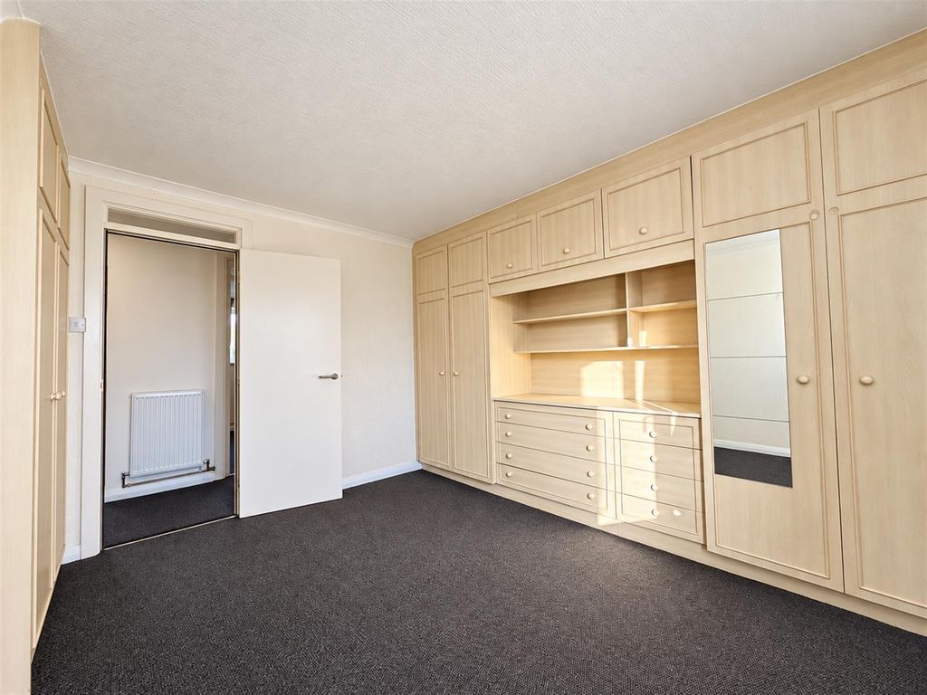 Property photo 1 of 9 Warmly Lit Built-In Hallway.Png
