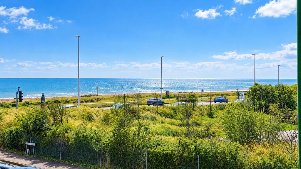 Property photo 2 of 13 Coastal Road And Sparkling Sea.Png