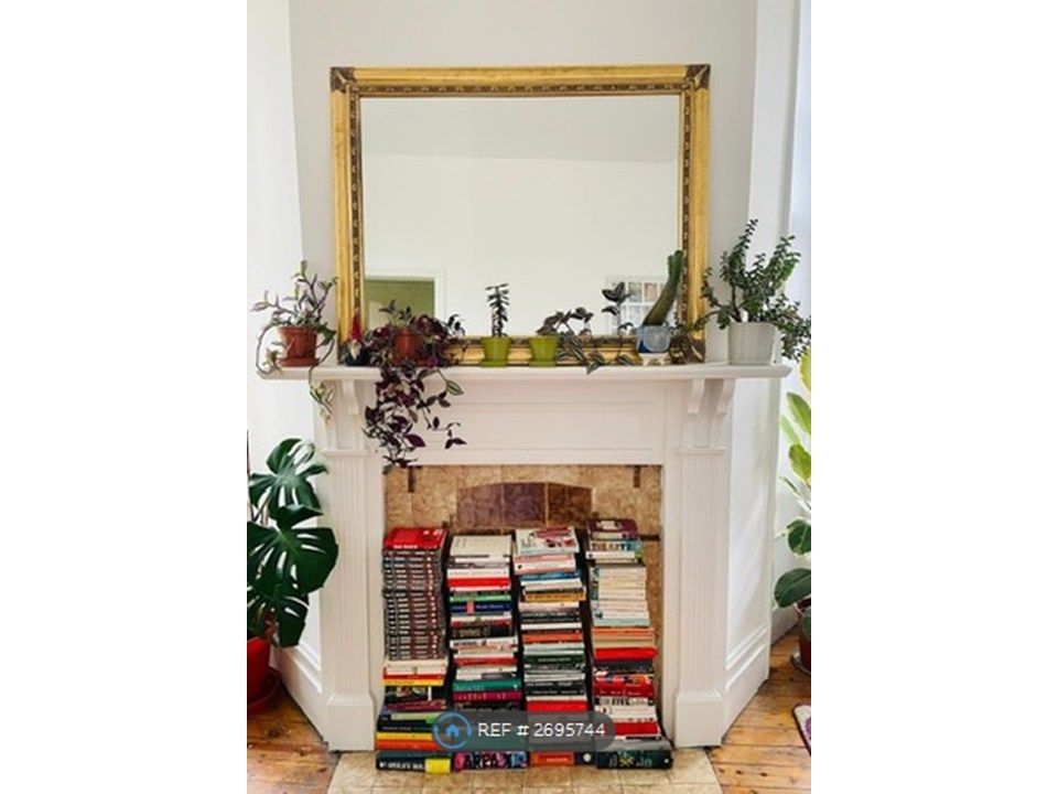 Property photo 2 of 11 Lounge Fireplace