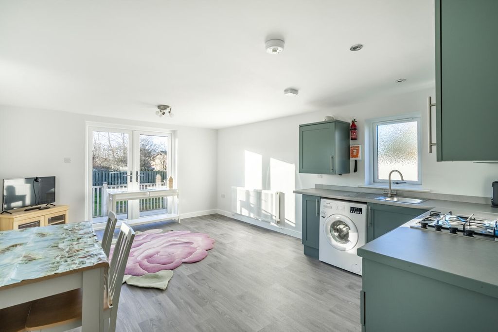 Property photo 3 of 12 Kitchen