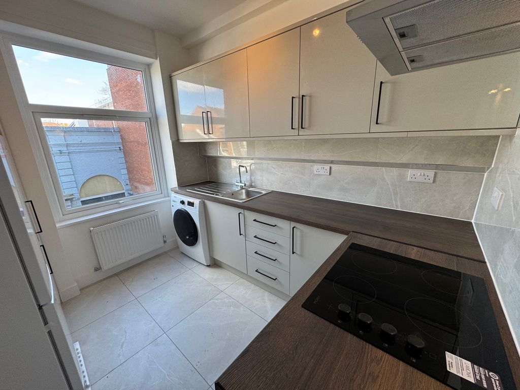 Property photo 2 of 12 Kitchen