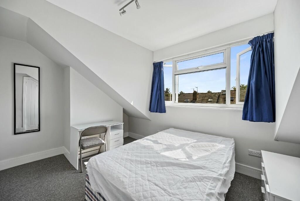 Property photo 2 of 15 Bright Double Bedroom Featuring A Well-Lit Window ...