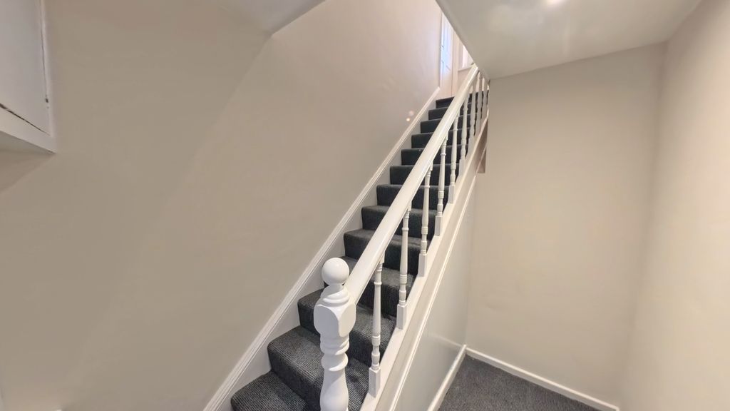 Property photo 2 of 10 Hallway/Stairs